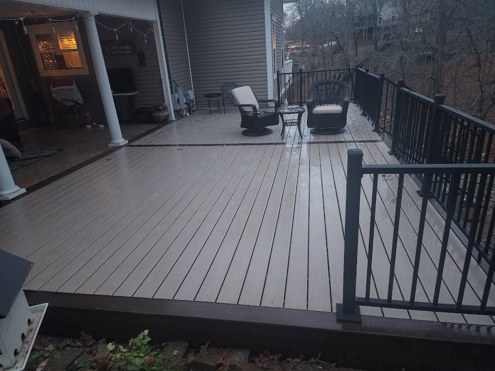 Composite deck with metal railing